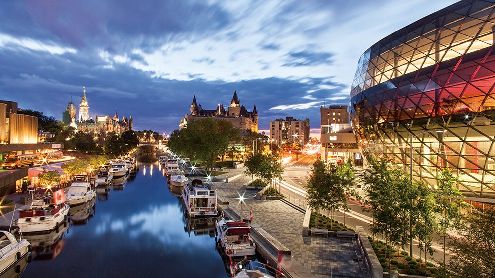 Summer night view of the Rideau Canal and Rogers Centre